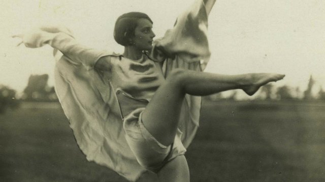 Old photo of woman dancing.