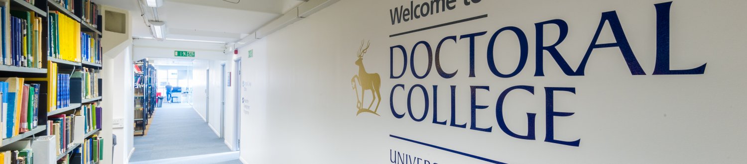 A wall in the Doctoral College at University of Surrey with the college name written on it