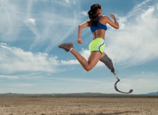 Woman running with bionic leg