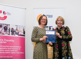 Dr. Bella Honess Roe collects Athena Swan Award