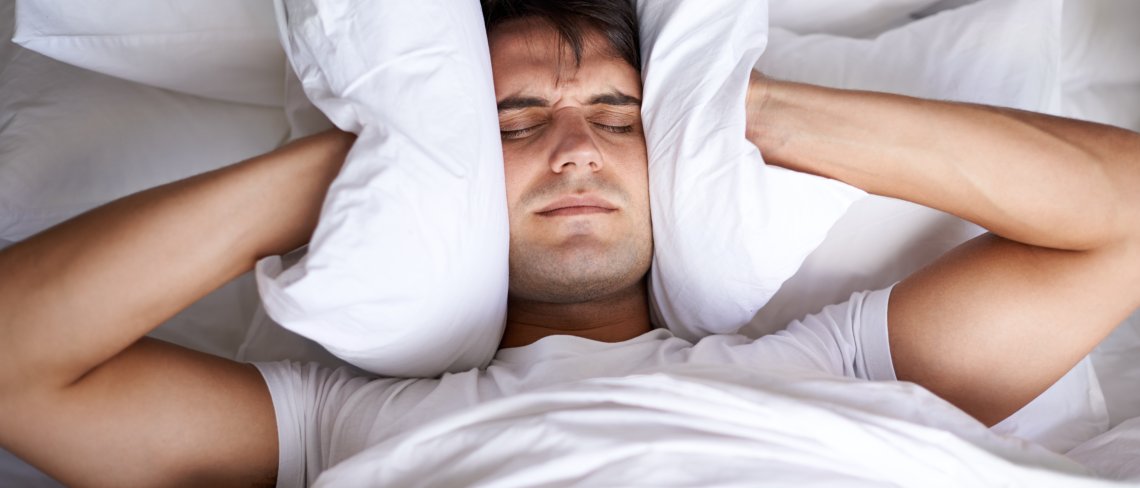 Person struggling to sleep