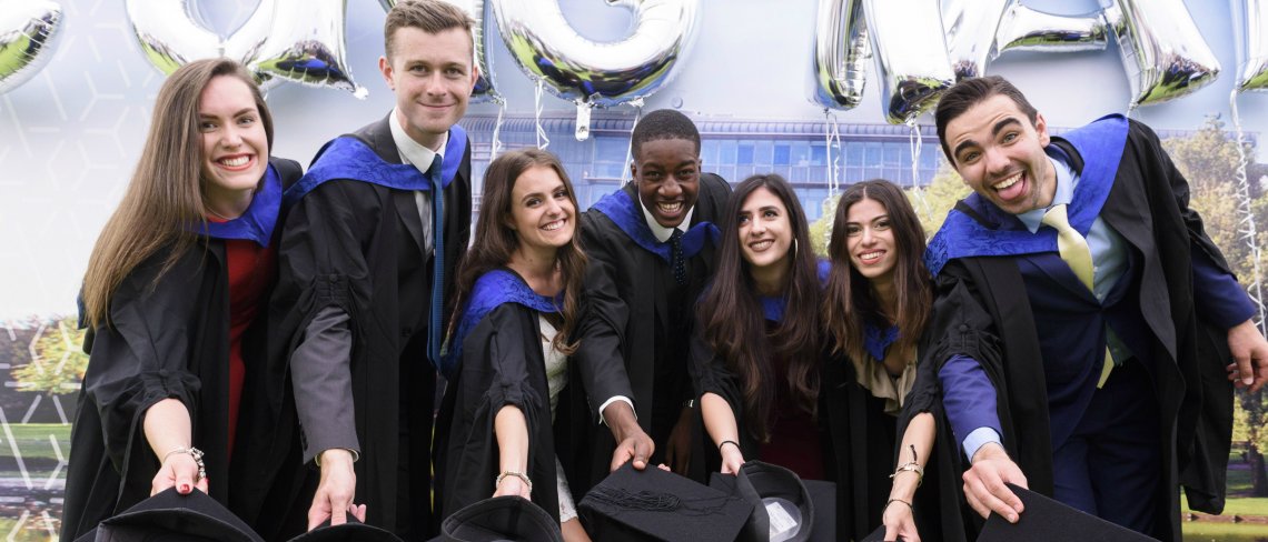 Students standing in line after graduation ceremony