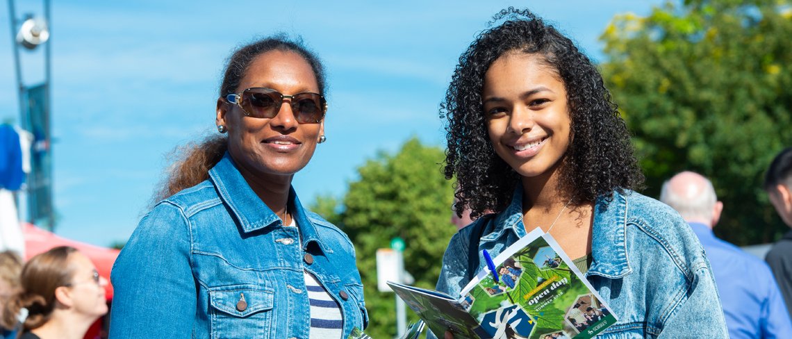 A mother and daughter at an open day at Surrey