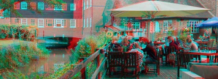 People sitting on picnic benches