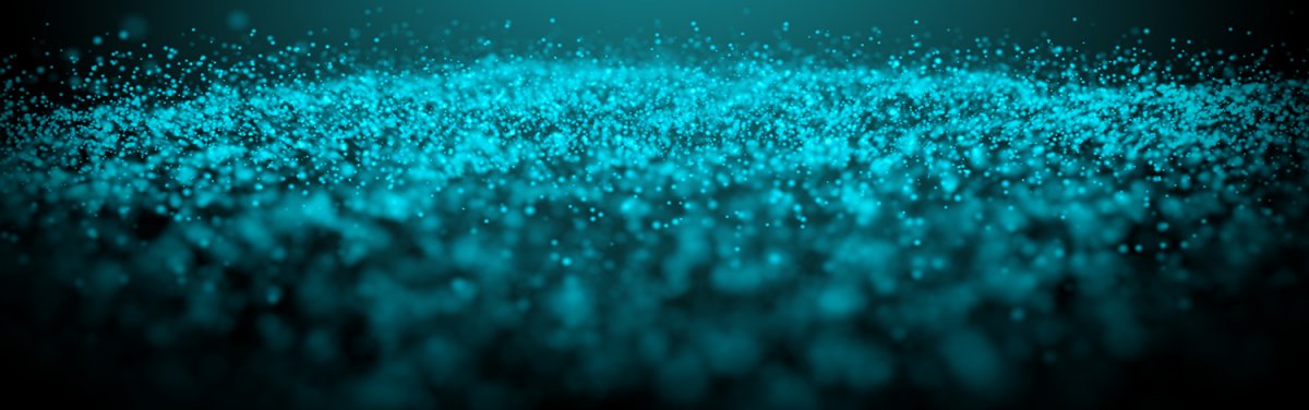 A glowing teal glitter cloud on a dark empty background