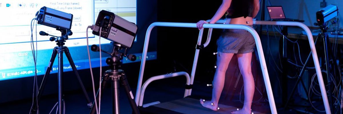 Student walking on treadmill in the Human Movement Laboratory
