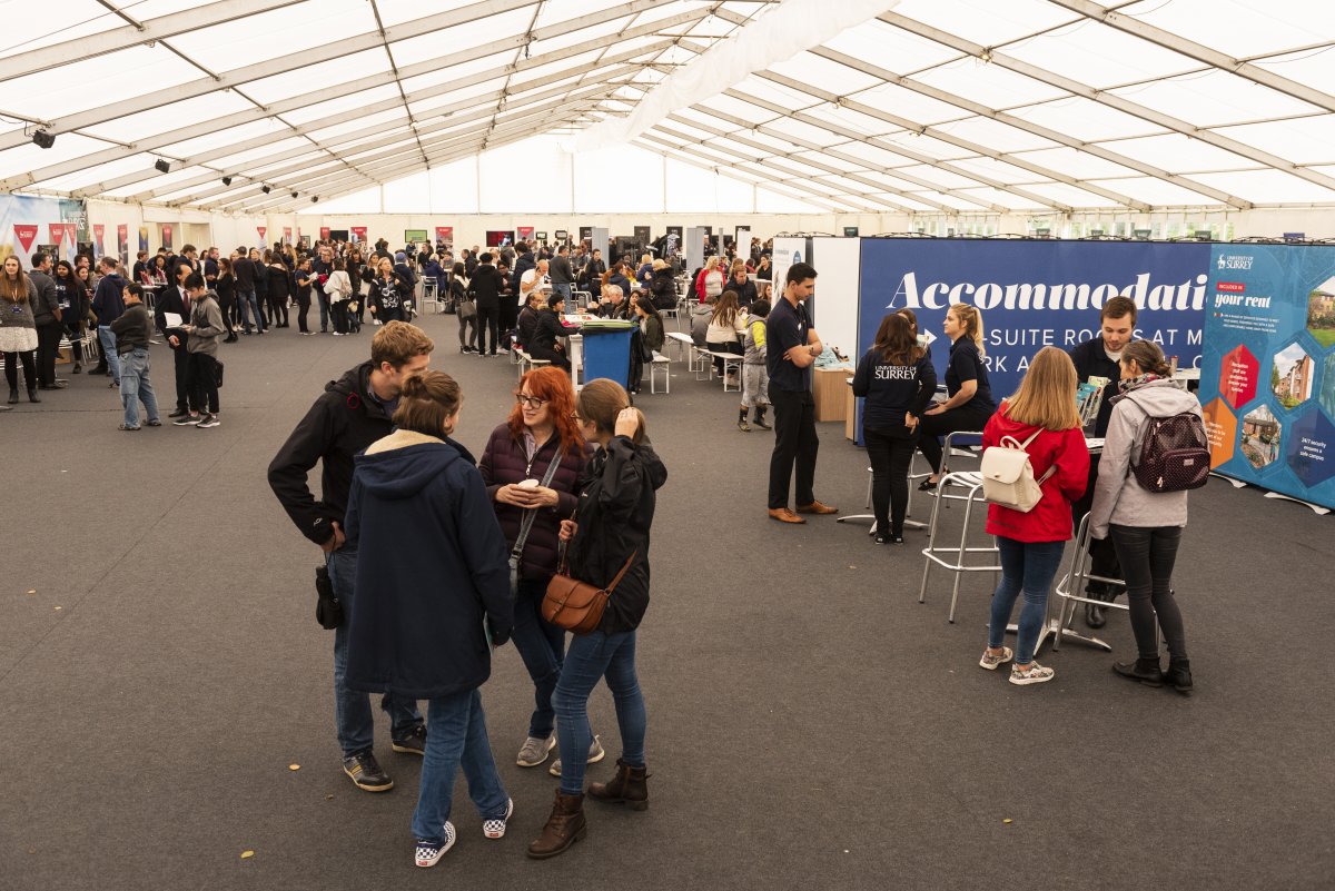 Group of students talking at the Open day marquee