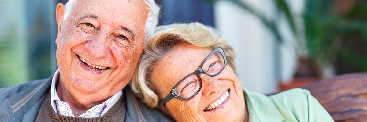 smiling elder couple