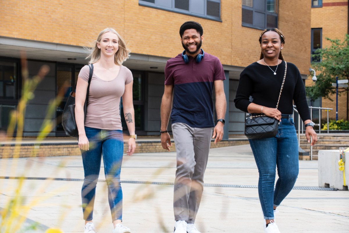A group of students walking on campus