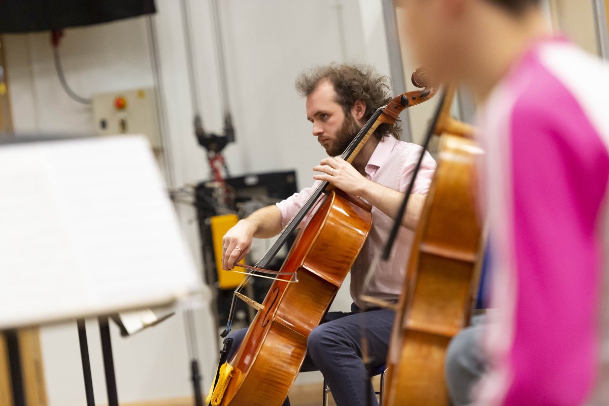 Music master's student playing cello