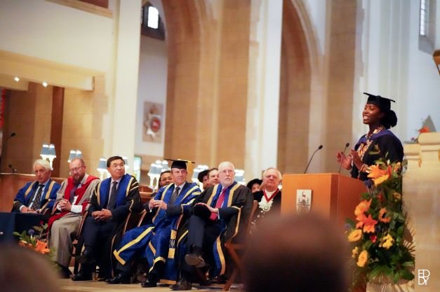 Newly graduated Marie Wiseborn giving speech at Law graduation ceremony in July 2022