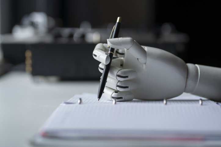 artificial robotic arm write down some notes with pen