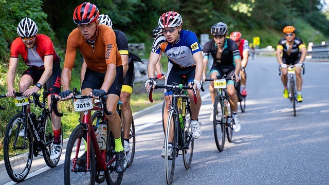 cycling on the road in a group - source pixabay