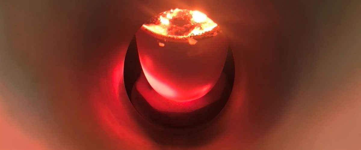 Molten lunar simulant in a microwave cavity