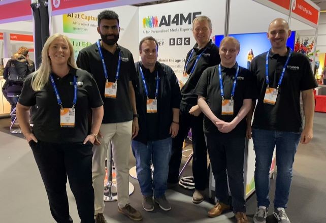 AI4ME showcase. Group of researchers at event