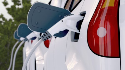 Electric car being charged