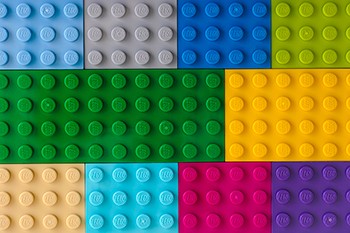 An aerial shot of multi-coloured lego bricks