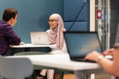 Students study on laptops