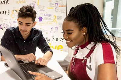 Two students working in the MySurrey Hive