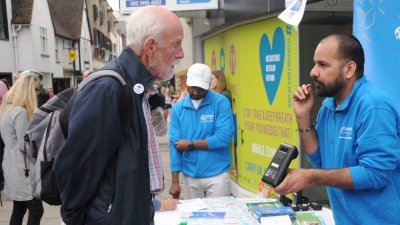 GCARE member talking to member of the public at Car Free Day