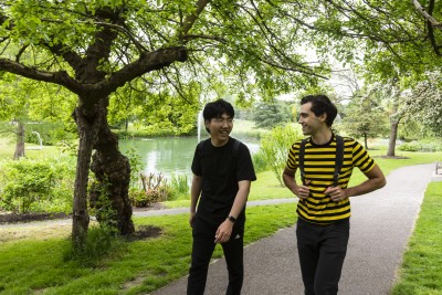 Students walking by the lake on campus