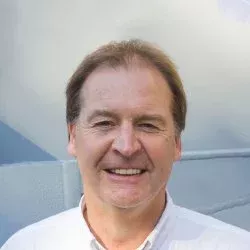 Visiting Professor Chris Cowls MBA of the University of Surrey