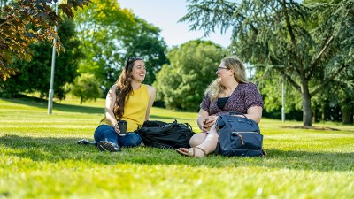 Students sitting on the grass
