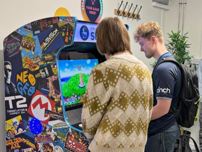 Student playing arcade game