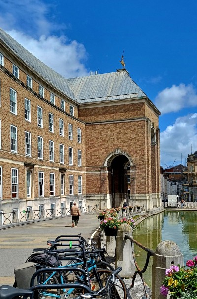 An impressive building in Bristol next to a canal.