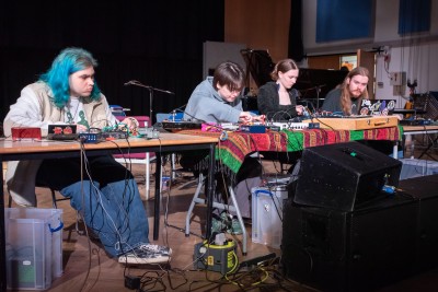 University of Surrey Creative Music Technology students working at tables