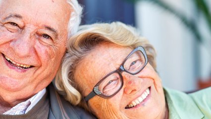 smiling elder couple