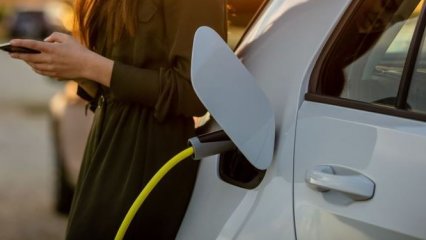 Woman using EV 