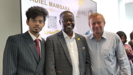 Royal Brunei's Satheesh Durai and Adiel Mambara with University of Surrey's Dr Frankie O'Connell at Air Transport Management MSc careers talk