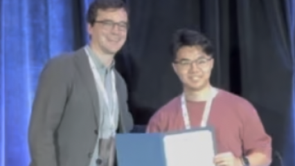 Haohe Liu receiving his award