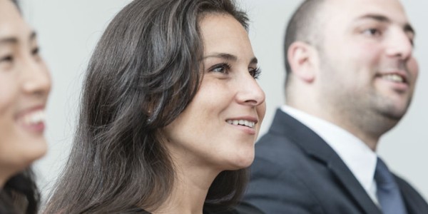 Image of three people learning