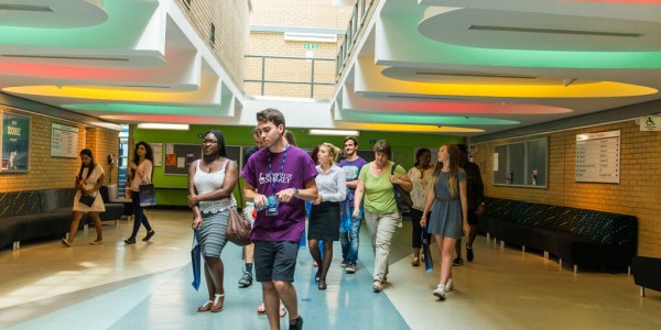 Student campus tour inside building