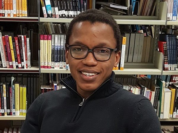 William Sereki in the library