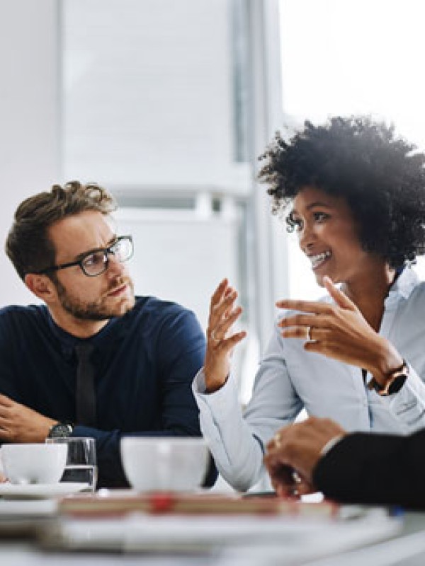 People talking at a table
