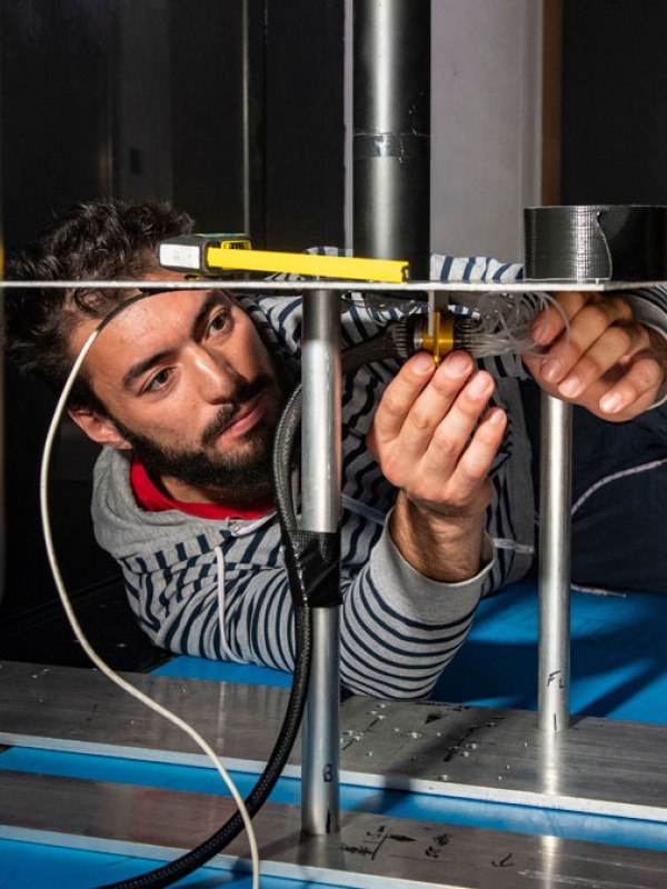 Student using civil engineering equipment