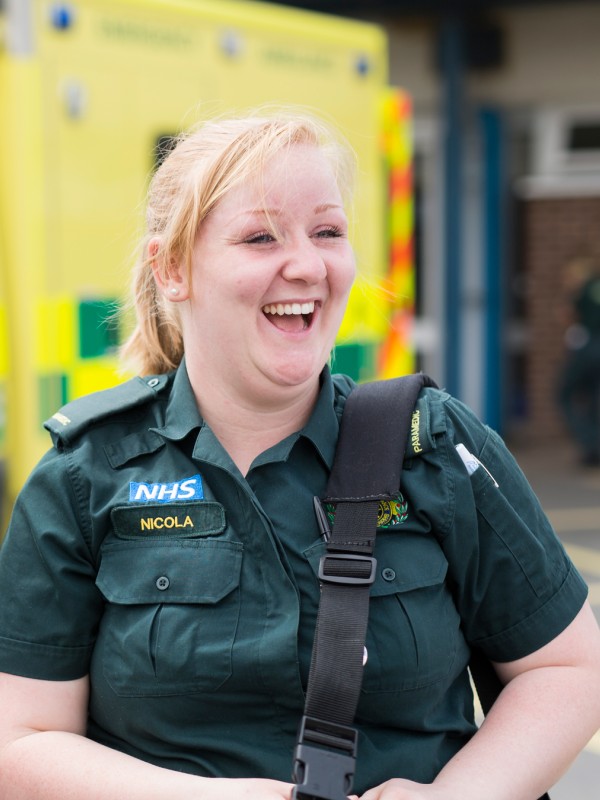 Paramedic student walking next to qualified paramedic