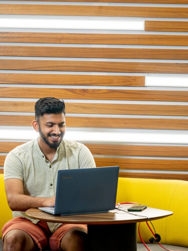 Postgraduate Student working on laptop