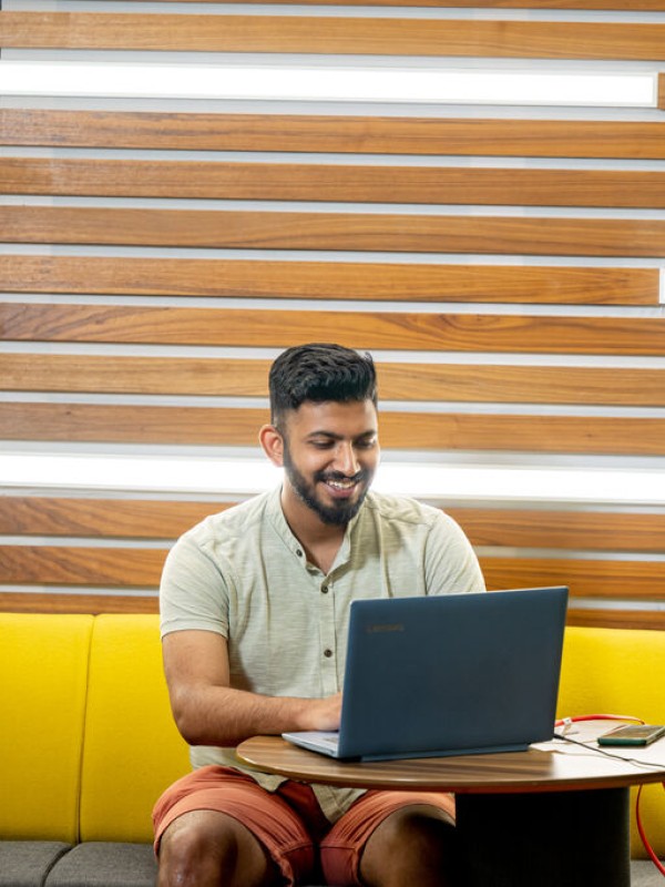 Postgraduate Student working on laptop