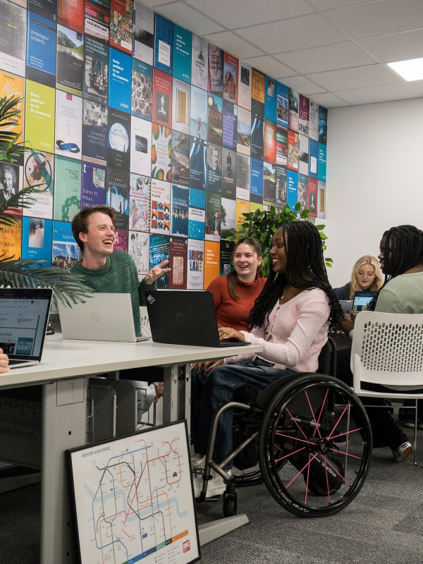 Literature students in workspace