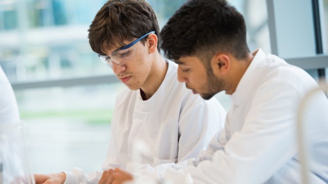 Two male students in a laboratory