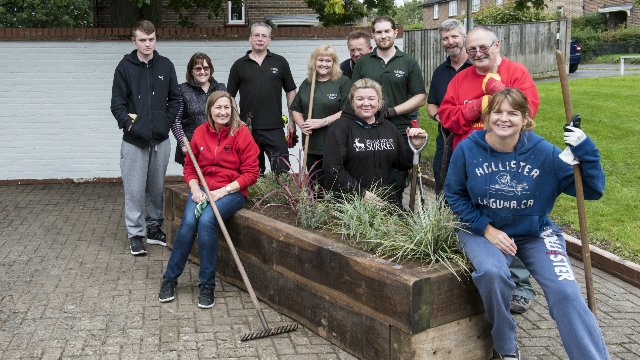 Estates team at a community garden