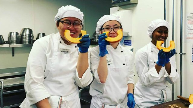 Three Lakeside students in a kitchen