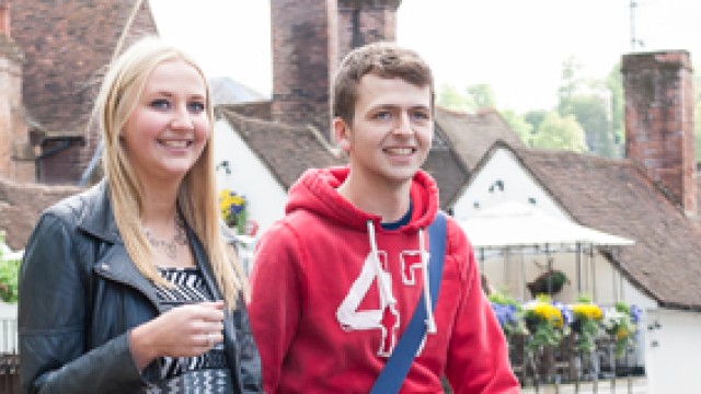 Male and female students talking