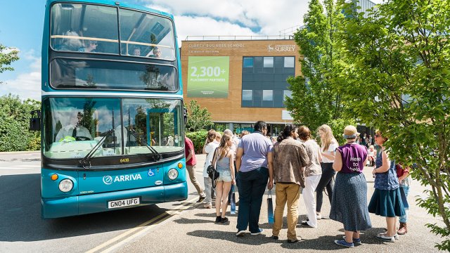 Students boarding a bus on campus