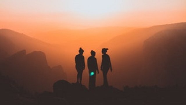 Silhouettes of three women