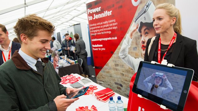 Student speaking to employer